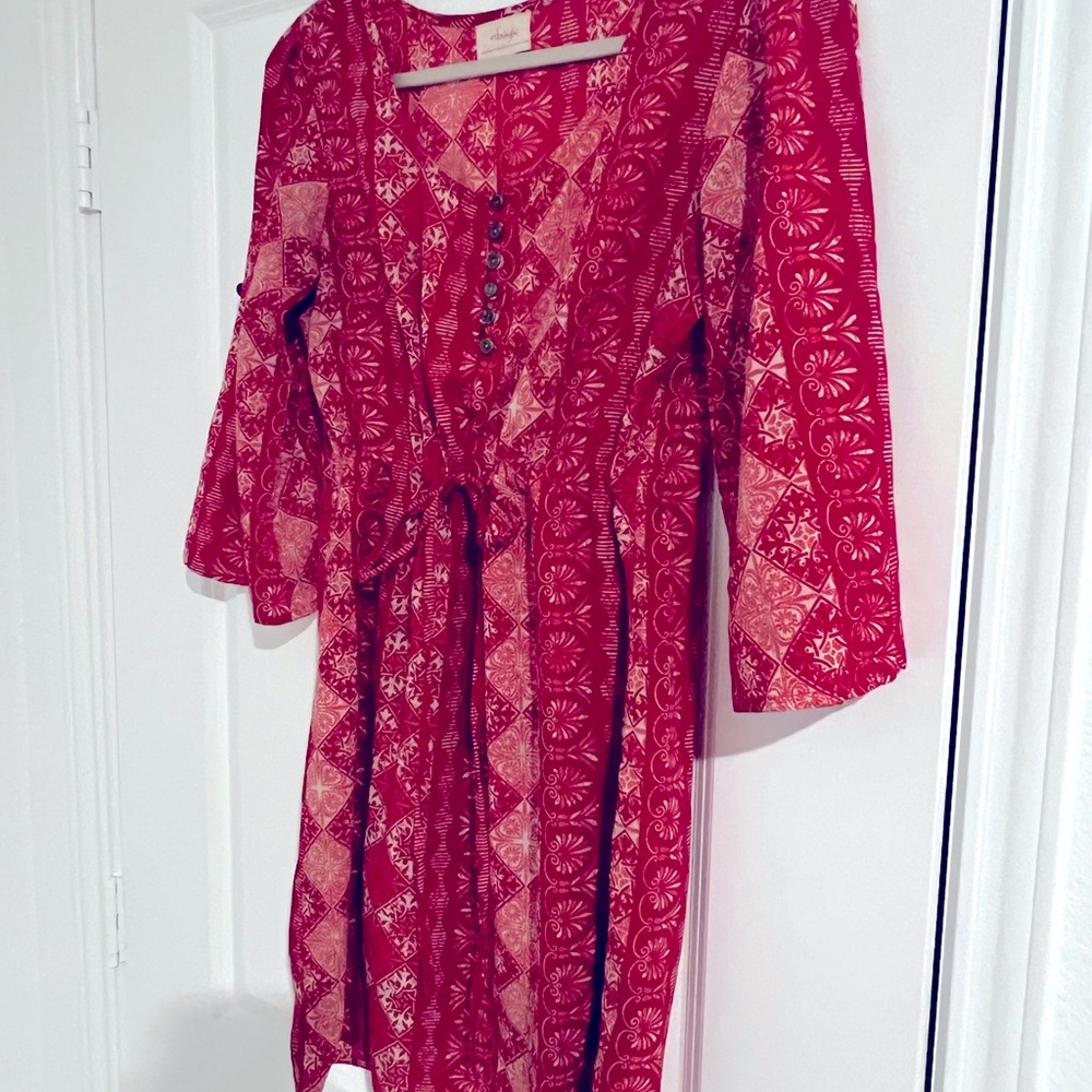 Beautiful red dress designed by an Israel based female clothing designer in Cali